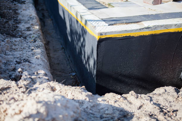 Professional Waterproofing technician working in Denver, IN